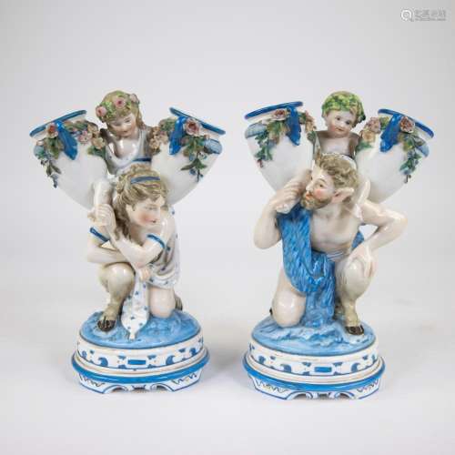 Pair of porcelain sculptures marked KPM depicting a female a...