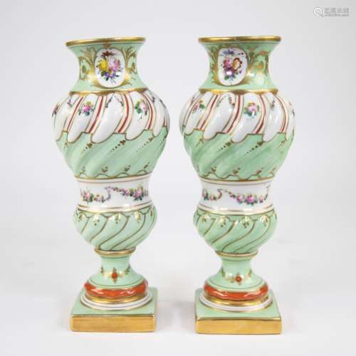 Pair of Sévres vases with hand-painted floral motifs and gil...