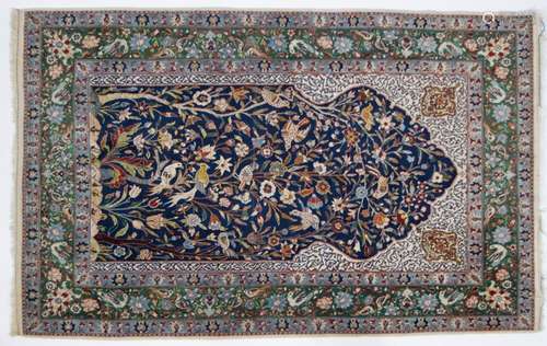 Persian carpet with floral decor and birds