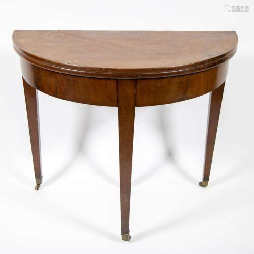 A semi-circular mahogany veneered console table or demi-lune...