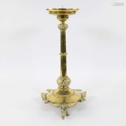 Large gilded brass candlestick on dragon feet