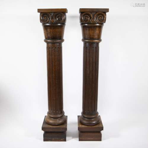 Pair sleek oak column columns