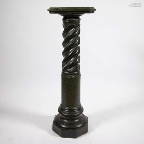 Green marble column with partly twisted column