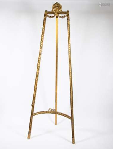 A Louis XV style easel of gold-patinated wood and matching s...