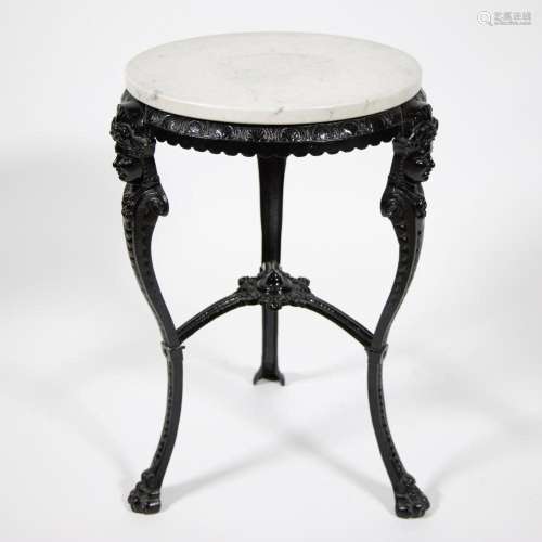 Black cast iron table with caryatids as legs and white marbl...