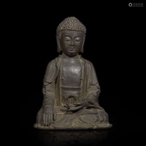A Chinese bronze figure of a seated Buddha 铜佛造像一件 Ming...