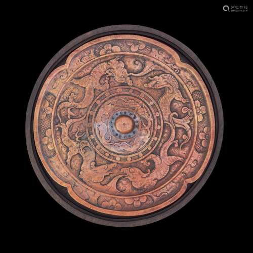 A Chinese carved "Mirror" inkstone with hardwood b...