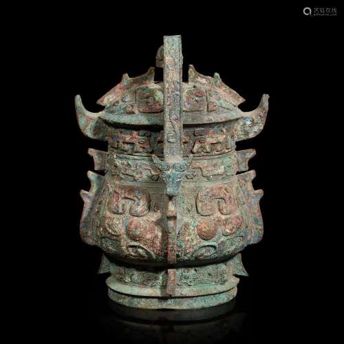 A Chinese archaistic bronze covered ritual wine vessel, You ...