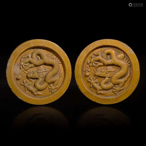 Two Chinese yellow glazed "Dragon" roof tile ends ...