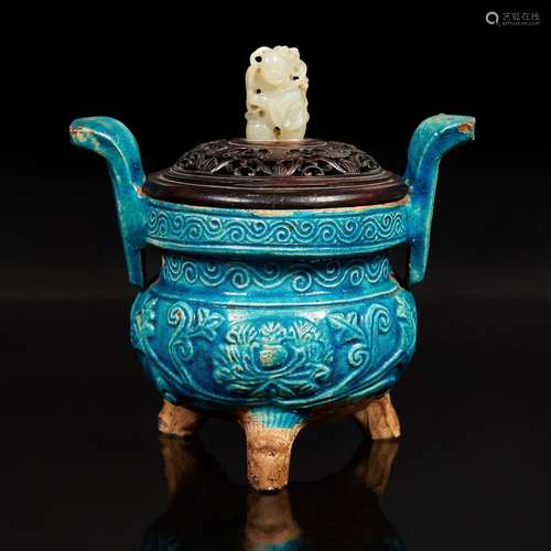 A Chinese turquoise-glazed tripod censer with carved wood co...