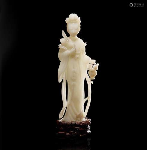 A Chinese carved white jade figure of a meiren 白玉雕美人 19...