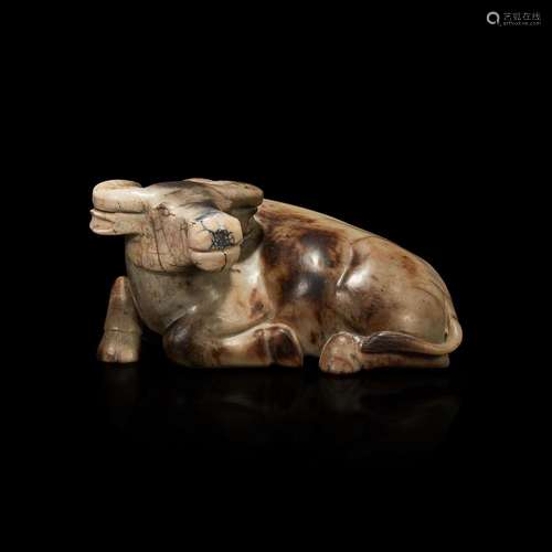 A Chinese partially calcified greyish-beige jade buffalo 灰白...