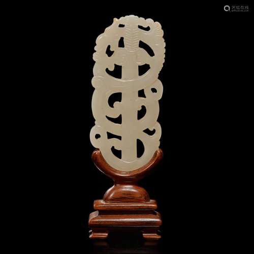 A Chinese white jade "sword" pendant and wood stan...