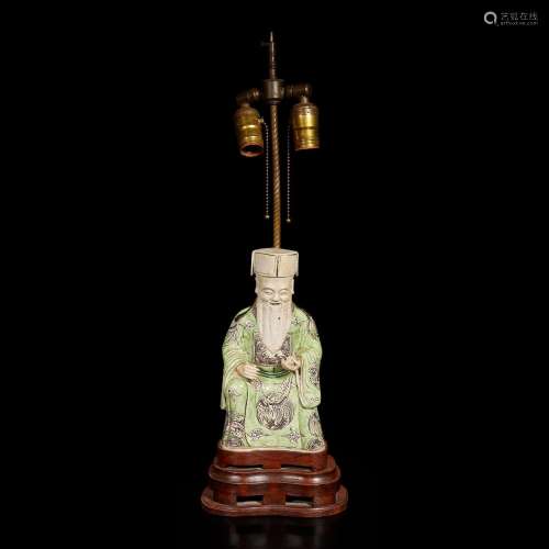 A Chinese famille verte-decorated figure of Cai Shen, mounte...