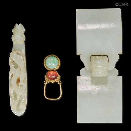 Two Chinese white jade buckles and a third buckle 白玉带钩两...