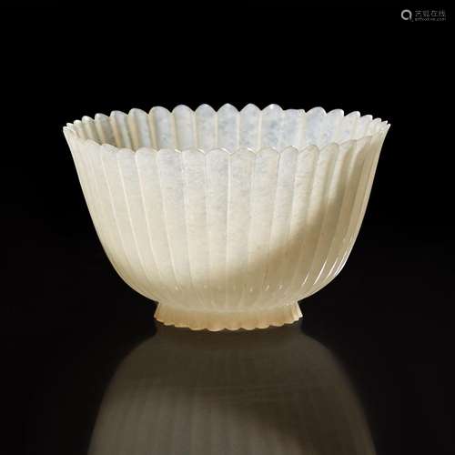 A Chinese carved white jade "Chrysanthemum" cup 玉...