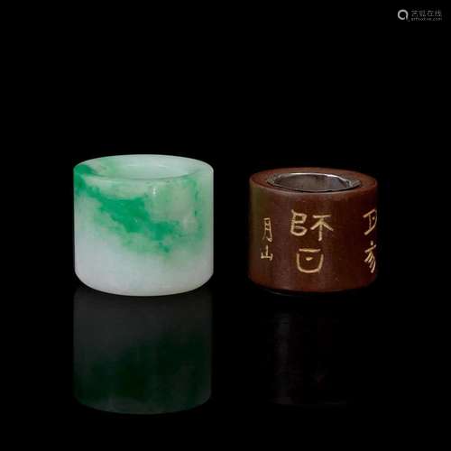 A Chinese jadeite and a wood archer's ring 翡翠及木质扳指各一...