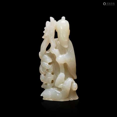 A Chinese small carved white jade figure of Shoulao, Deer, B...