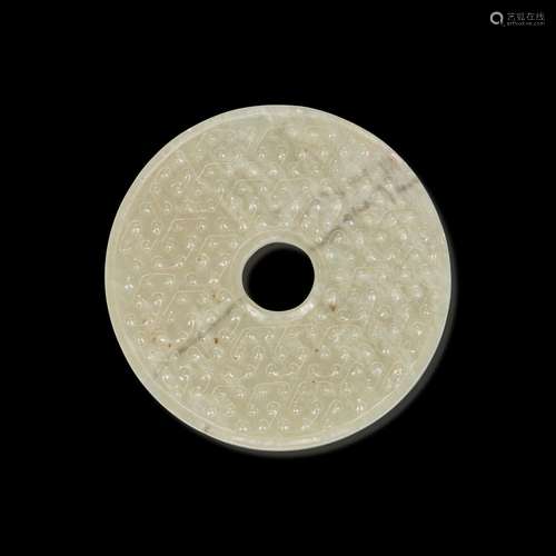 A Chinese greyish white jade archaistic bi disk 灰白玉璧