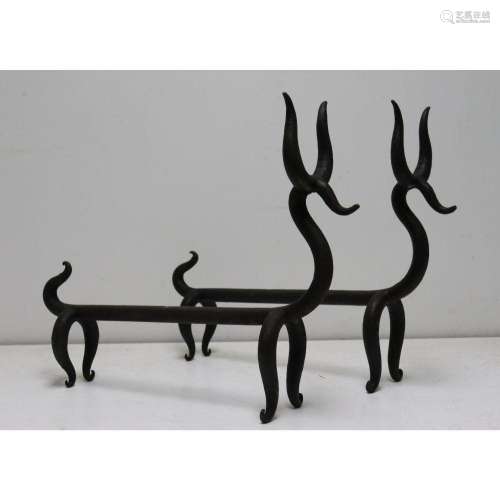 A Pair Of Wrought Iron Dog Form Andirons.