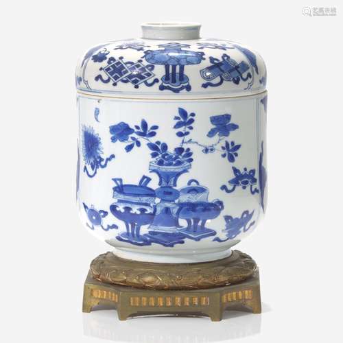 An ormolu-mounted Chinese blue and white porcelain jar and c...