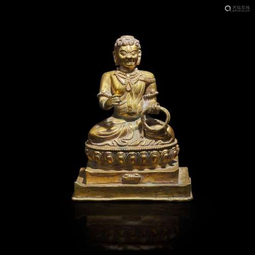 A Tibeto-Chinese style gilt copper alloy figure of Acalanath...