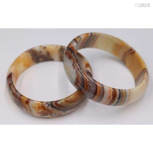 JEWELRY. Pair of Banded Agate Bangle Bracelets.