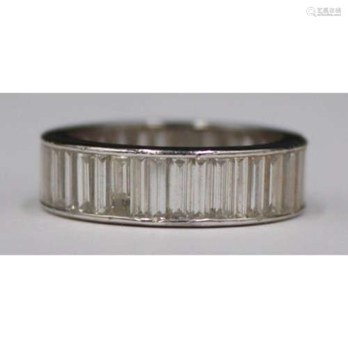 JEWELRY. Platinum and Diamond Baguette Band Ring.