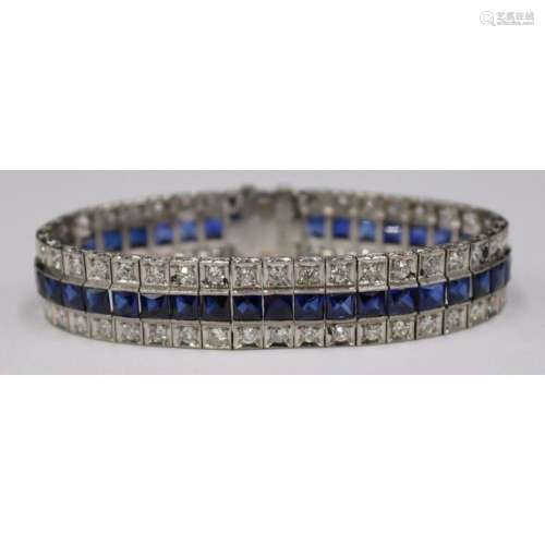 JEWELRY. Platinum Diamond and Colored Gem Bracelet
