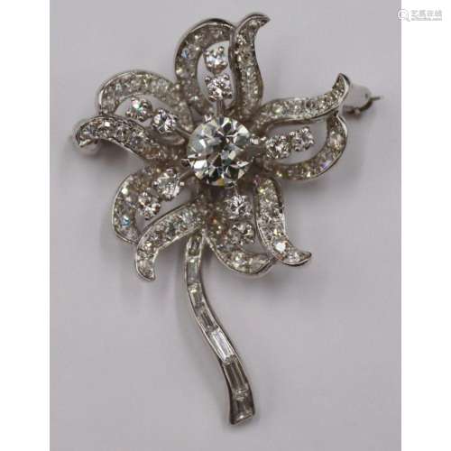 JEWELRY. Platinum and Diamond Floral Form Brooch.