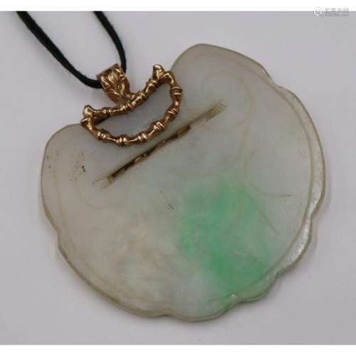 JEWELRY. 14kt Gold Mounted Carved Jade Pendant.