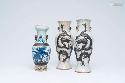 A pair of Chinese Nanking crackle glazed relief decorated 'd...