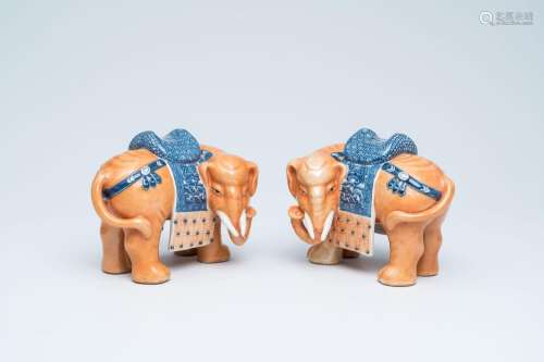 A pair of Chinese polychrome models of elephants, 20th C.<br...