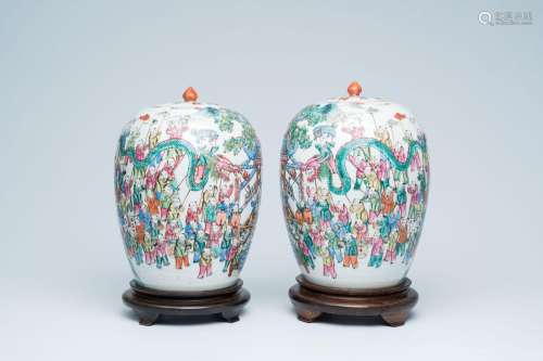 A pair of Chinese famille rose '100 boys' jars and covers, 1...