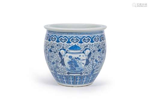 A large Chinese blue and white jardiniere with boys carrying...