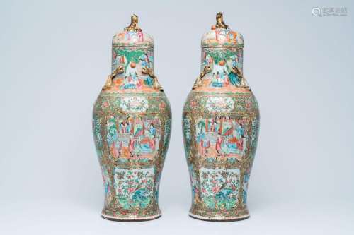 A pair of Chinese baluster shaped Canton famille rose vases ...