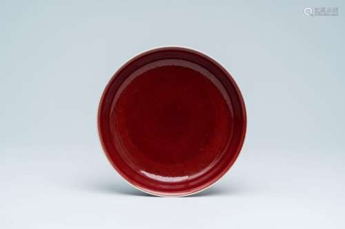 A Chinese monochrome coppe-red plate, Xuande mark, 19th/20th...