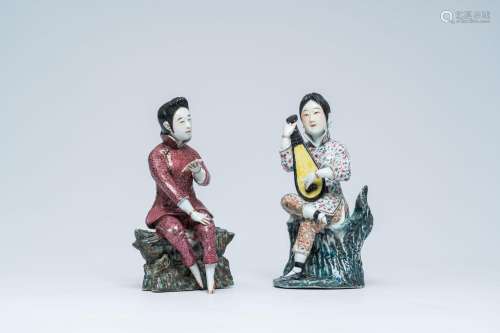 Two Chinese famille rose figures of a lady making music and ...
