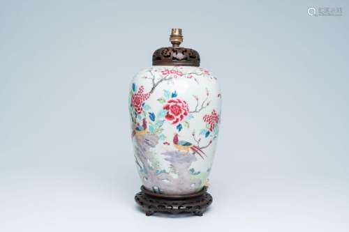 A Chinese famille rose ginger jar with birds among blossomin...