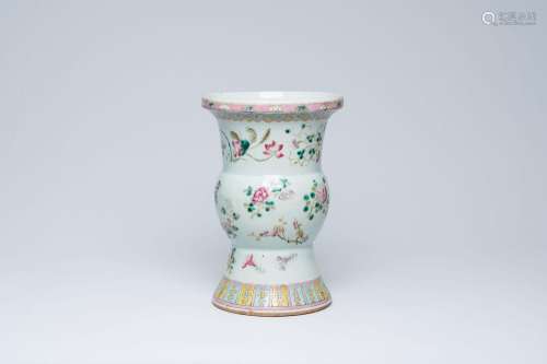 A Chinese famille rose vase with floral design, 19th C.<br /...