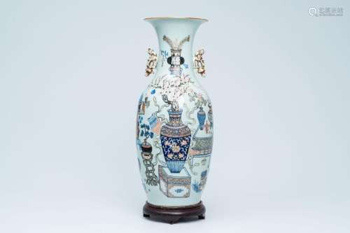A Chinese doucai 'antiquities' vase, 19th/20th C.<br />
H 61...