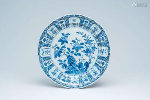 A Chinese blue and white charger with floral design, 19th C....