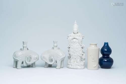 A Chinese monochrome blue double gourd vase and a varied col...