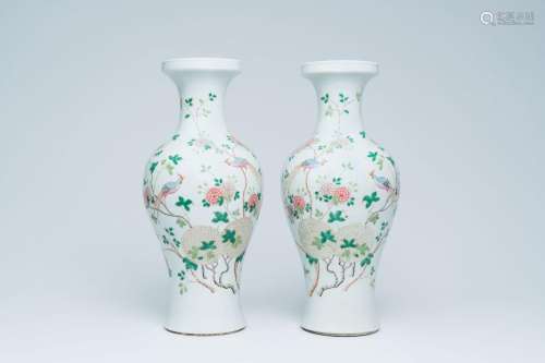A pair of Chinese baluster shaped vases with birds among blo...