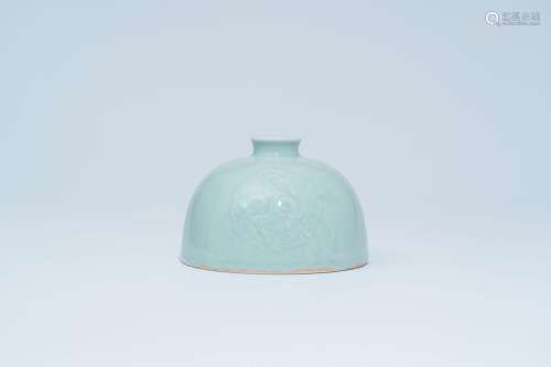 A Chinese celadon beehive water pot with underglaze design, ...