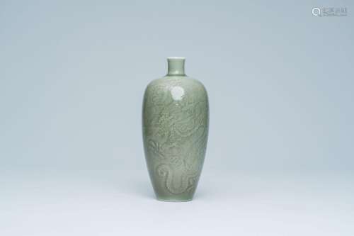 A Chinese celadon vase with anhua dragon design, Kangxi mark...