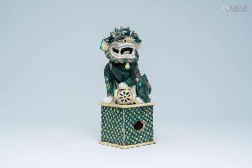 A Chinese verte biscuit model of a Buddhist lion, 19th C.<br...