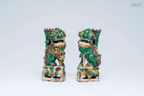 A pair of Chinese sancai glazed biscuit Buddhist lion joss-s...