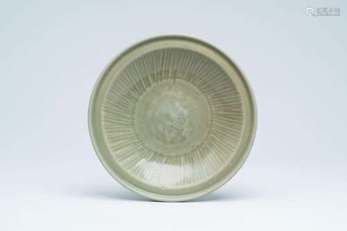 A Chinese Longquan celadon dish, Ming<br />
Diameter: 25,5 c...