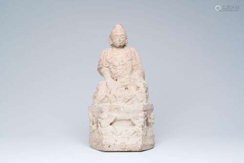 A Chinese carved stone group of Buddha on a throne, Wei or l...